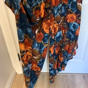 Super cute romper! Almost looks like a sun dress when it’s on!